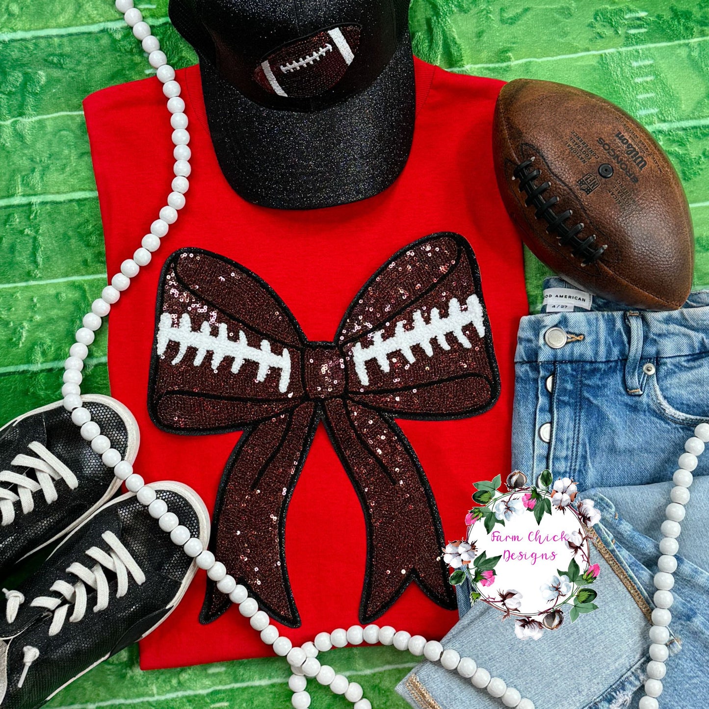 SEQUIN FOOTBALL BOW SWEATSHIRT